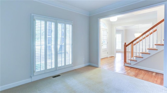 251 Waterford Cove Dr, Suwanee, GA 30024 - entryway with plenty of natural light, ornamental molding, baseboards, and stairway