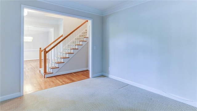 251 Waterford Cove Dr, Suwanee, GA 30024 - stairs with baseboards, crown molding, carpet flooring, a chandelier, and wood finished floors