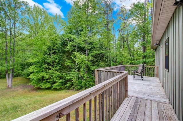 deck featuring a yard