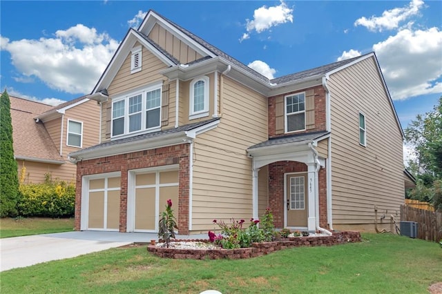 craftsman-style house with a front lawn and a garage