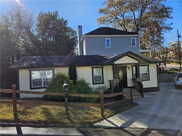 3268 Mae Ave, Brookhaven, GA 30319 - traditional home with a fenced front yard and a chimney