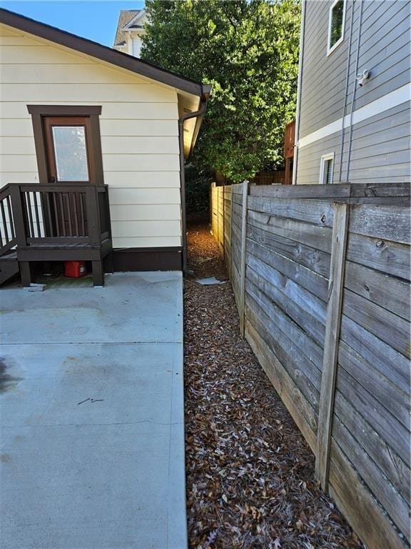 3268 Mae Ave, Brookhaven, GA 30319 - view of side of home with fence and a patio area