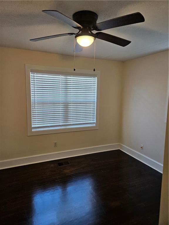 3268 Mae Ave, Brookhaven, GA 30319 - spare room with baseboards, visible vents, dark wood finished floors, and a wealth of natural light