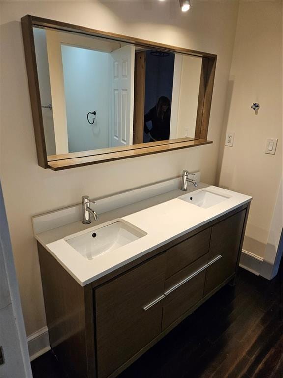 3268 Mae Ave, Brookhaven, GA 30319 - full bathroom featuring a sink, baseboards, double vanity, and wood finished floors