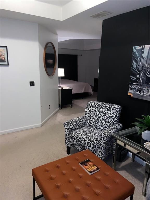 bedroom featuring baseboards, visible vents, and carpet flooring