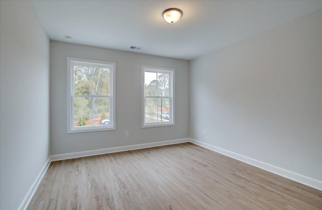 empty room featuring light hardwood / wood-style floors