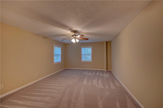 535 Toonigh Rd, Woodstock, GA 30188 - unfurnished room featuring light carpet, a ceiling fan, a textured ceiling, and baseboards