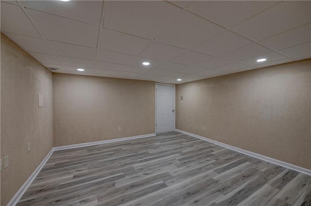535 Toonigh Rd, Woodstock, GA 30188 - finished basement featuring wood finished floors, recessed lighting, a paneled ceiling, and baseboards