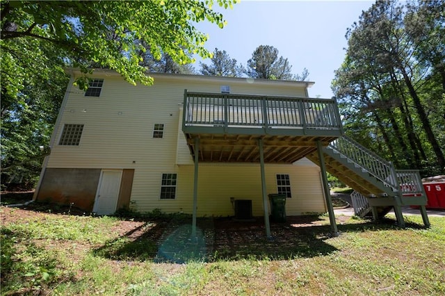 535 Toonigh Rd, Woodstock, GA 30188 - back of house with a wooden deck, stairway, and central AC unit