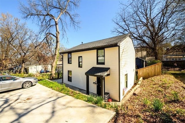 view of side of home with a patio