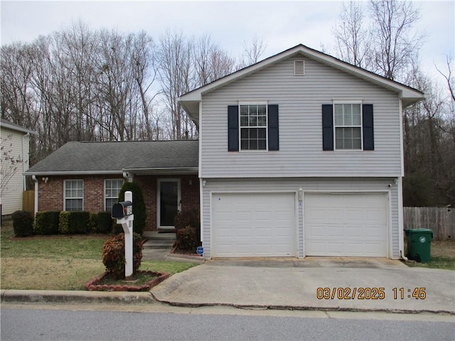 view of front facade featuring an attached garage, brick siding, fence, concrete driveway, and a front lawn