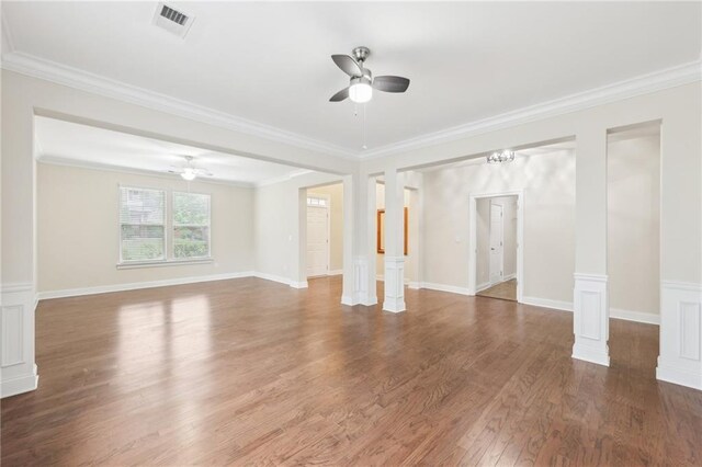 2760 Lions Gate Dr, Cumming, GA 30041 - unfurnished living room with a ceiling fan, decorative columns, wood finished floors, and crown molding
