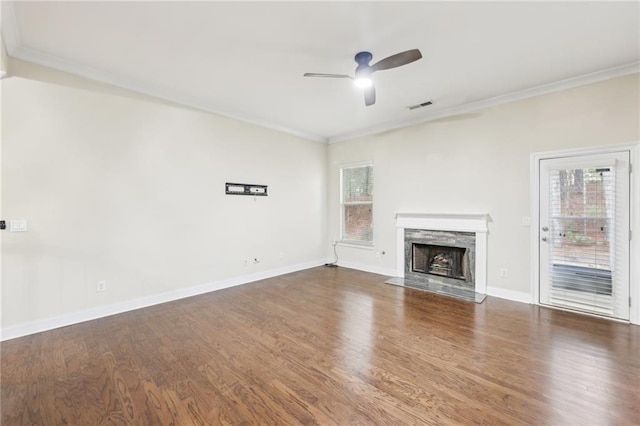 2760 Lions Gate Dr, Cumming, GA 30041 - unfurnished living room with crown molding, healthy amount of natural light, ceiling fan, and wood finished floors