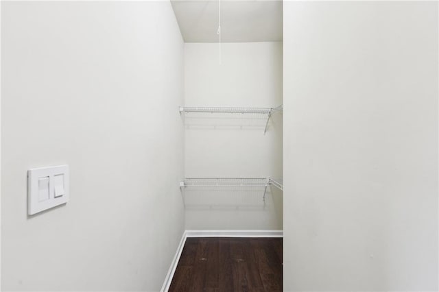 2760 Lions Gate Dr, Cumming, GA 30041 - walk in closet featuring wood finished floors