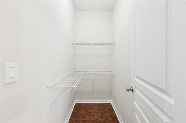 2760 Lions Gate Dr, Cumming, GA 30041 - walk in closet with wood finished floors
