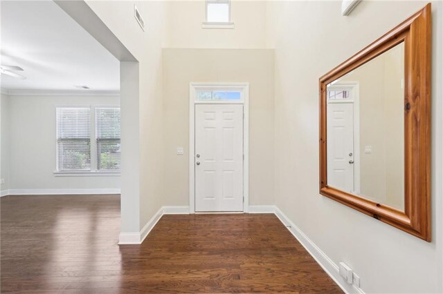 2760 Lions Gate Dr, Cumming, GA 30041 - foyer entrance featuring healthy amount of natural light, dark wood-type flooring, baseboards, and crown molding