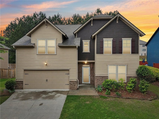 2760 Lions Gate Dr, Cumming, GA 30041 - view of front of home with brick siding, a garage, and driveway