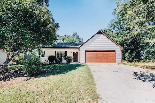 ranch-style home with a garage, concrete driveway, and a front lawn