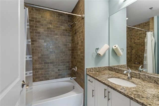 bathroom with vanity and shower / bath combo with shower curtain