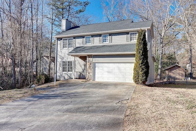 view of front of property with a garage