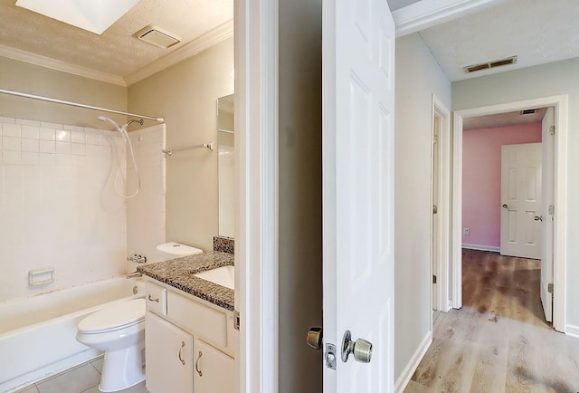 full bathroom with toilet, wood-type flooring,  shower combination, vanity, and crown molding