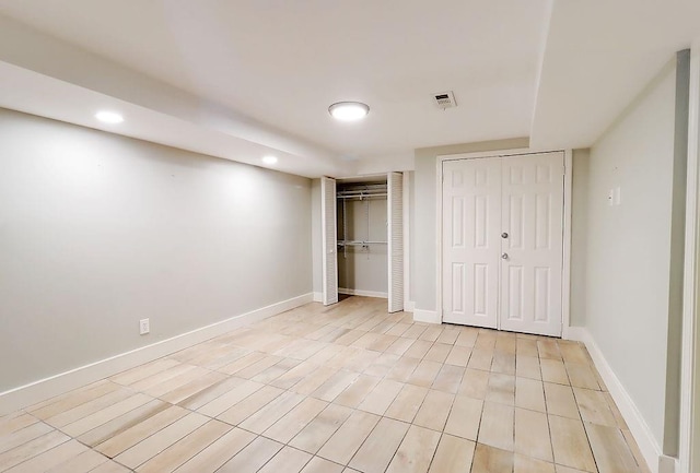 unfurnished bedroom with multiple closets