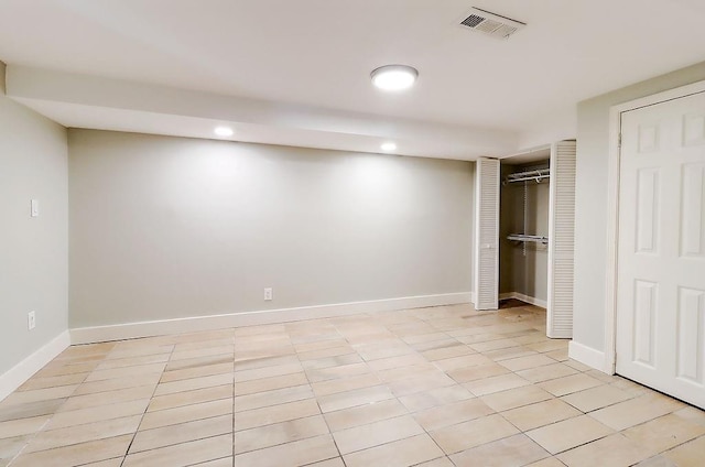 unfurnished bedroom with light tile patterned floors