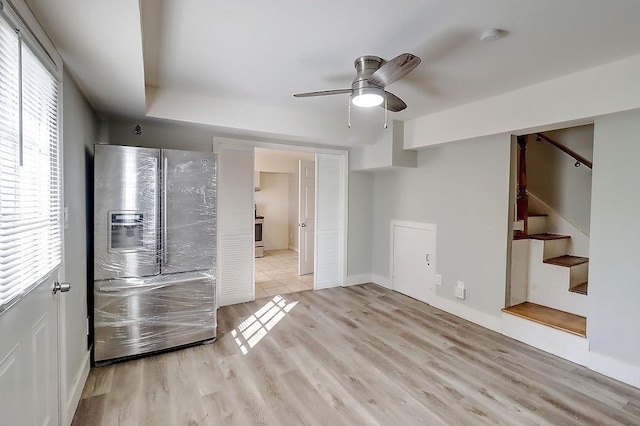 interior space featuring ceiling fan and light hardwood / wood-style floors