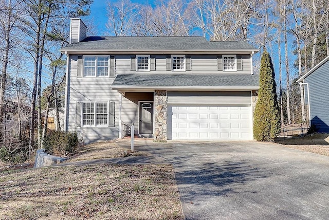 view of front property with a garage