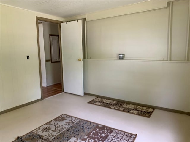 empty room with baseboards