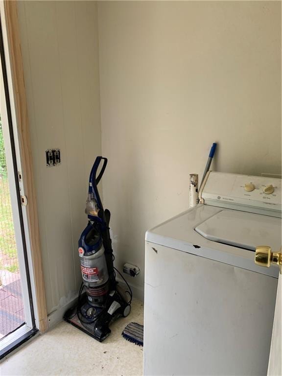 washroom featuring washer / clothes dryer and laundry area