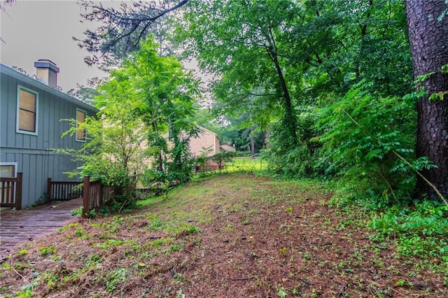 4766 White Oak Path, Stone Mountain, GA 30088 - view of yard featuring a deck