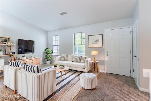 4766 White Oak Path, Stone Mountain, GA 30088 - carpeted living area featuring baseboards and vaulted ceiling
