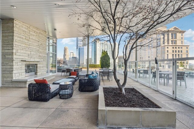 3325 Piedmont Rd NE Unit 1708, Atlanta, GA 30305 - view of patio / terrace featuring a city view and an outdoor hangout area