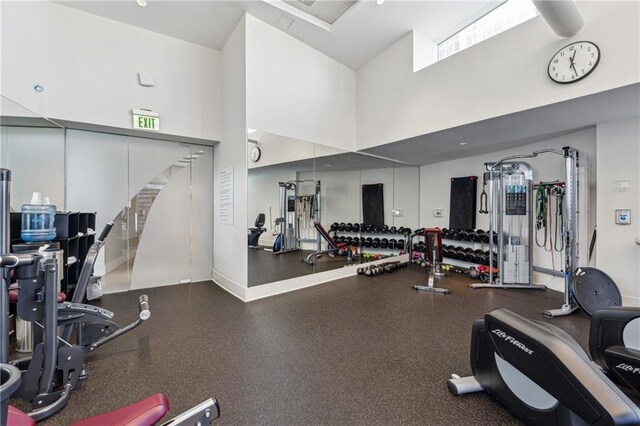 3325 Piedmont Rd NE Unit 1708, Atlanta, GA 30305 - exercise room featuring a high ceiling