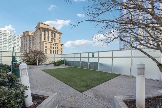 3325 Piedmont Rd NE Unit 1708, Atlanta, GA 30305 - view of yard featuring a patio area and fence