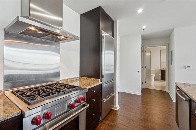 3325 Piedmont Rd NE Unit 1708, Atlanta, GA 30305 - kitchen featuring dark brown cabinetry, wall chimney range hood, recessed lighting, dark wood-style floors, and high end appliances