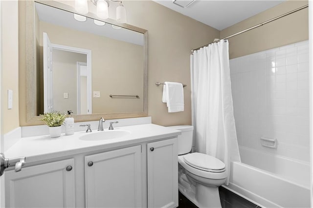 full bath with vanity, toilet, and shower / tub combo with curtain