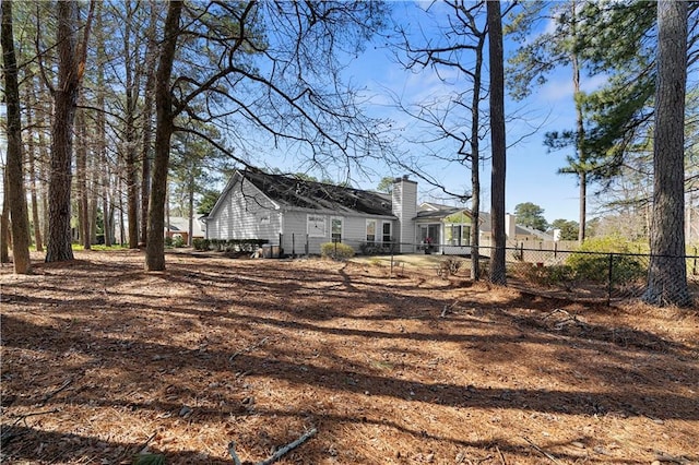 view of yard featuring fence