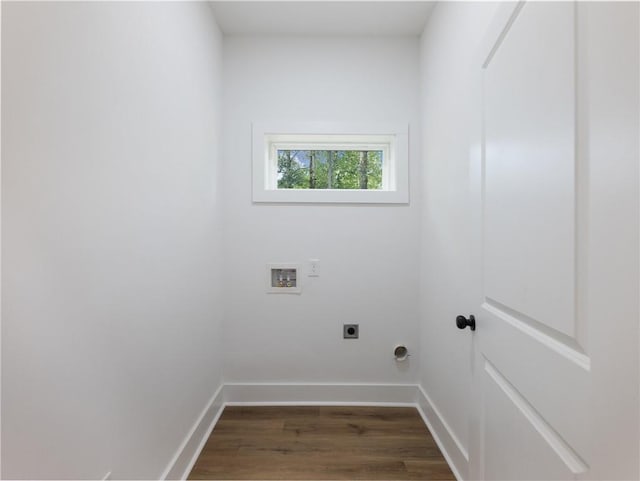 clothes washing area with washer hookup, electric dryer hookup, and dark hardwood / wood-style floors