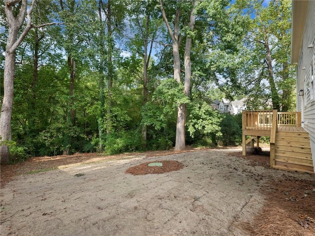 view of yard featuring a deck