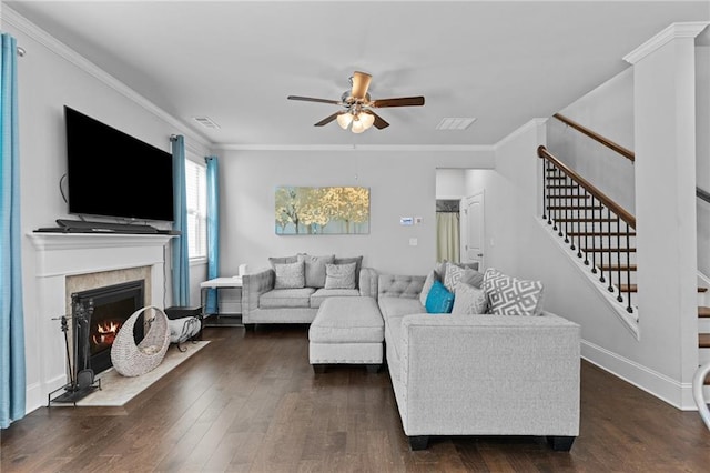4568 Mantova Dr, Buford, GA 30519 - living area with ceiling fan, stairway, dark wood-type flooring, and ornamental molding