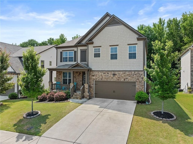4568 Mantova Dr, Buford, GA 30519 - craftsman inspired home with stone siding, covered porch, a garage, driveway, and a front yard