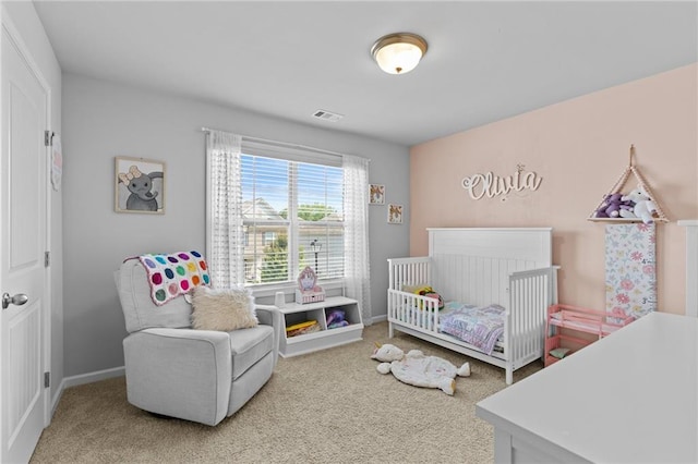 4568 Mantova Dr, Buford, GA 30519 - carpeted bedroom featuring a crib and baseboards