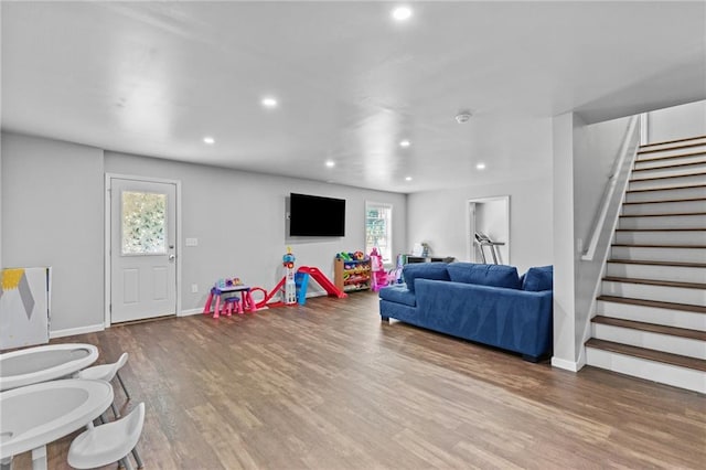 4568 Mantova Dr, Buford, GA 30519 - recreation room with recessed lighting, wood finished floors, and baseboards