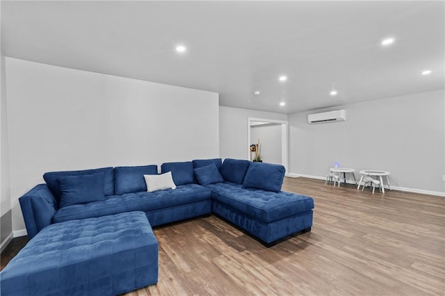 4568 Mantova Dr, Buford, GA 30519 - living room with wood finished floors, a wall mounted AC, baseboards, and recessed lighting