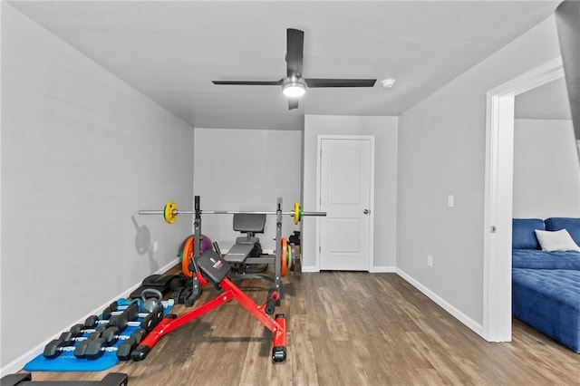4568 Mantova Dr, Buford, GA 30519 - workout area featuring wood finished floors, baseboards, and ceiling fan