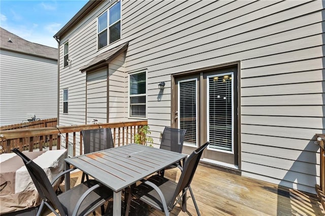 4568 Mantova Dr, Buford, GA 30519 - wooden terrace with outdoor dining area