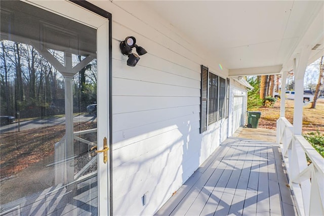 wooden terrace featuring a porch