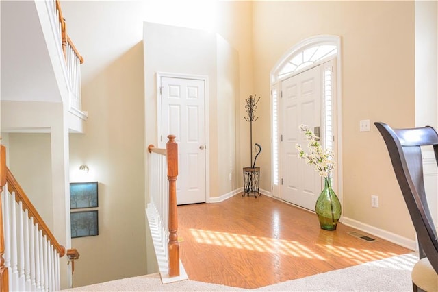 entrance foyer with light hardwood / wood-style flooring